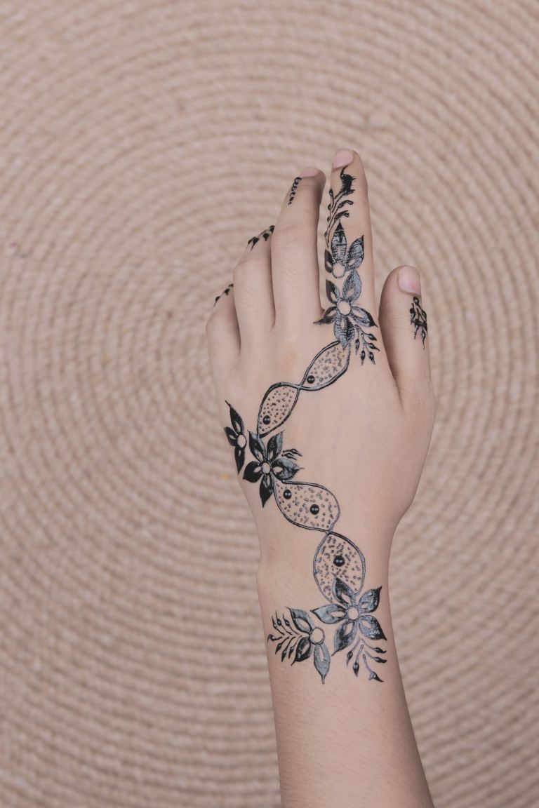 lack floral mehndi tattoo