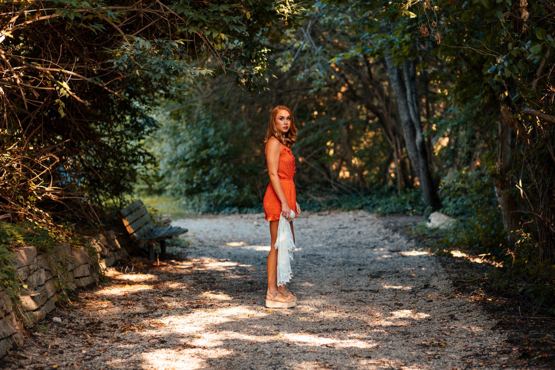 woman in orange sleeveless dress
