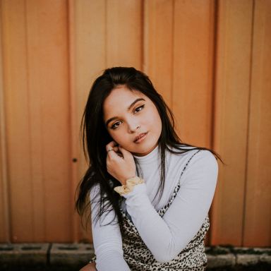woman in white long-sleeved shirt