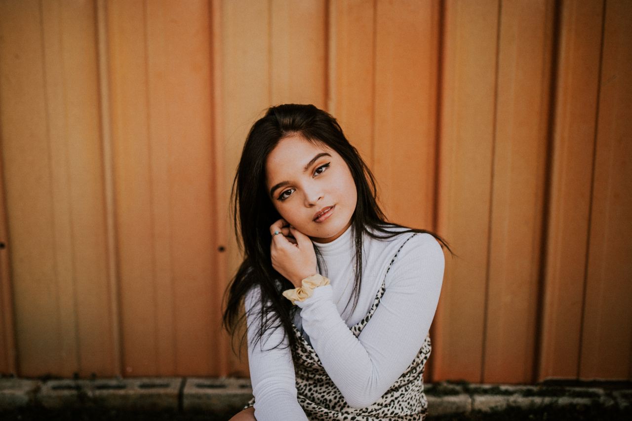 woman in white long-sleeved shirt