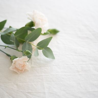 white flower on white textile
