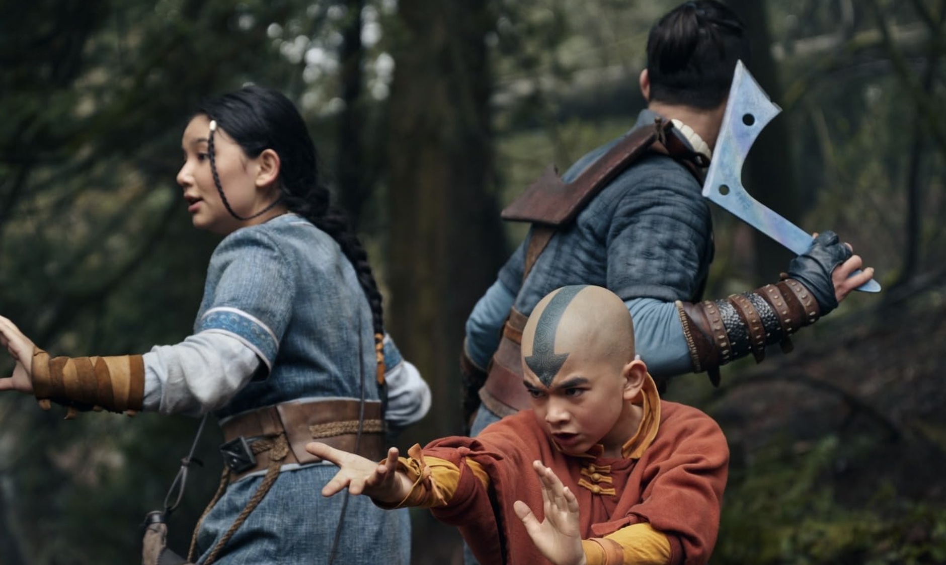 Kiawentiio, Gordon Cormier, and Ian Ousley in Avatar: The Last Airbender (2024)