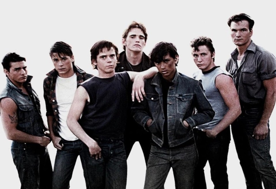 Tom Cruise, Matt Dillon, Emilio Estevez, Rob Lowe, Patrick Swayze, C. Thomas Howell, and Ralph Macchio in The Outsiders (1983)