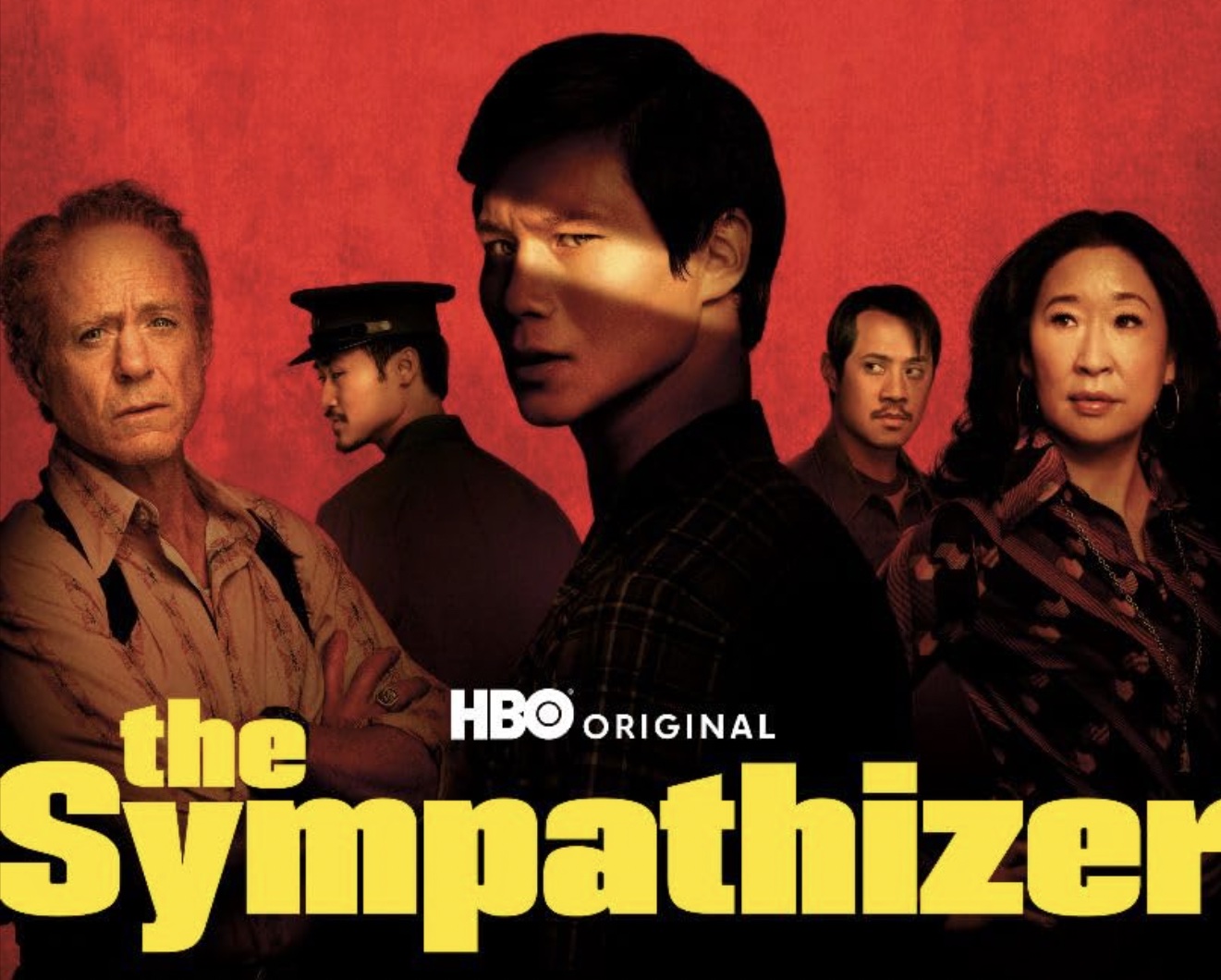 Robert Downey Jr., Sandra Oh, Hoa Xuande, and Fred Nguyen Khan in The Sympathizer (2024)